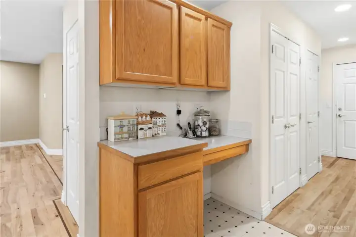 Kitchen desk area and ample cabinetry