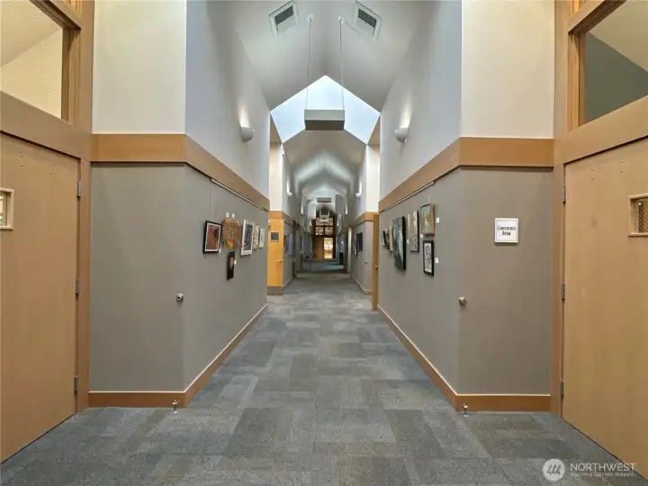 Bay Club - our local artists display their talents along this hall