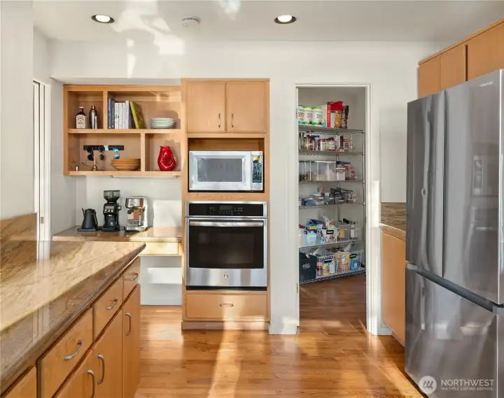 A walk-in pantry boosts already-good kitchen storage. A walk-in pantry boosts already-good kitchen storage.