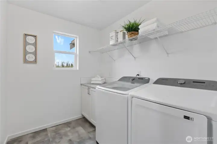 Dedicated laundry room with storage