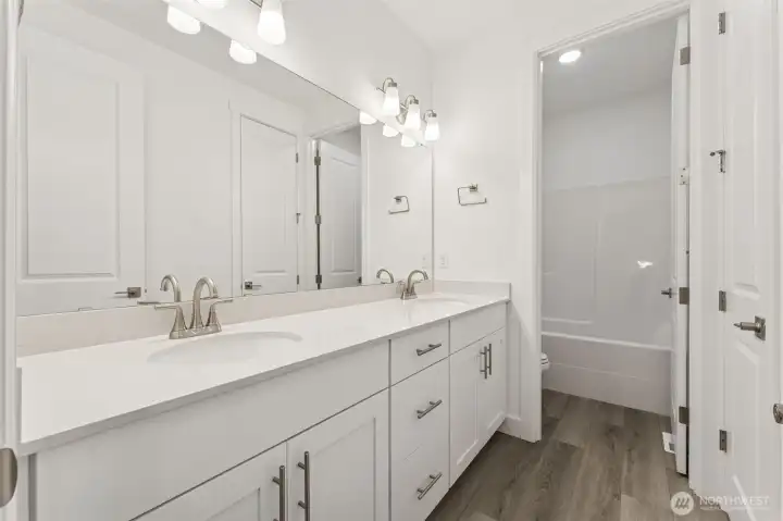Photos are of another Donovan Plan. Colors and finishes may vary.