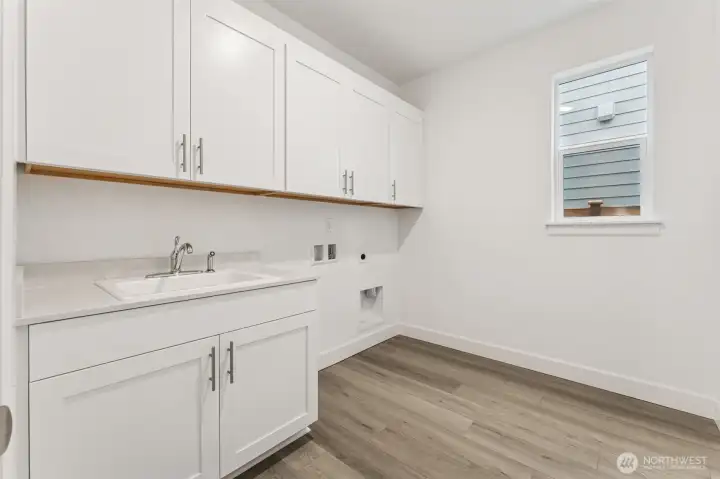 Photos are of another Donovan Plan. Colors and finishes may vary.
