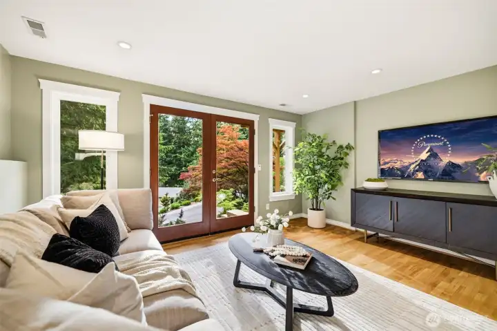 The lower level offers 2 bedrooms and a flexible space for a home theater, fitness studio, recreation room, or guest retreat.