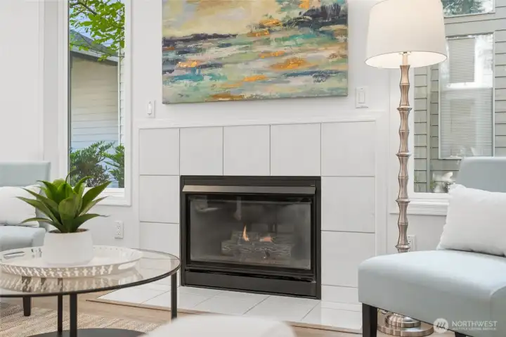 Gas fireplace adds warmth and character to the main living space.