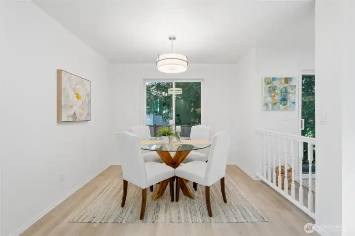 Open dining space connects seamlessly to the living room and kitchen.