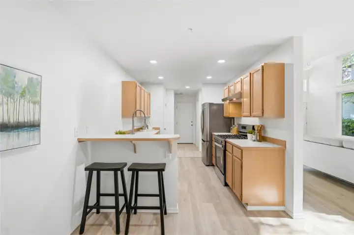 Open kitchen layout with ample workspace and storage.