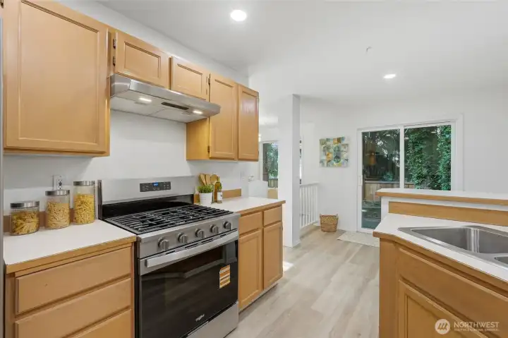 Plenty of cabinet space and direct access to outdoor living areas.