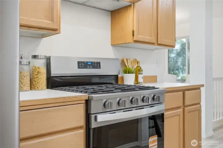 Well-designed workspace with abundant storage and preparation areas.