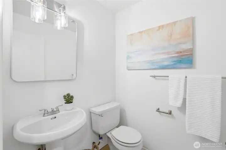 Convenient main-floor powder room for guests.