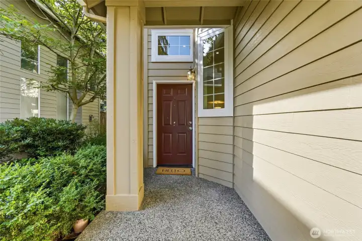 Covered front entry welcomes guests and provides weather protection year-round.