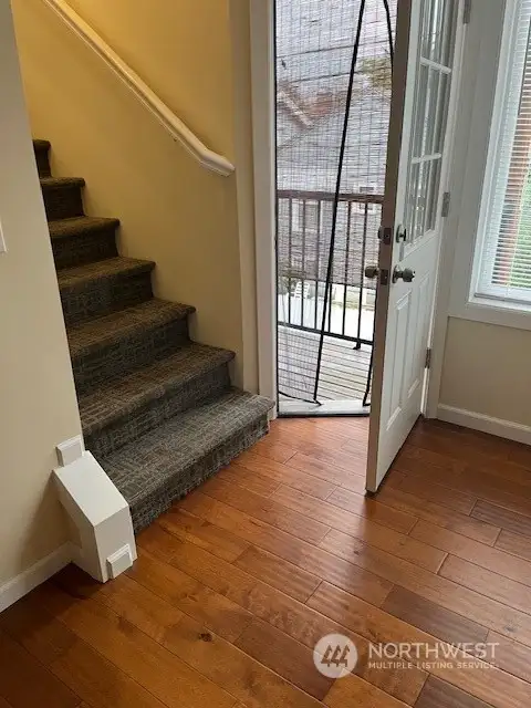 The main living area has a deck area with views. Take the stairs to the bedroom areas.