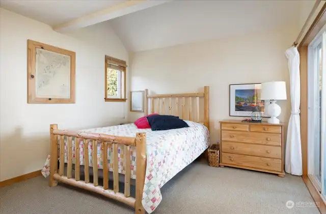 Primary bedroom on the main level. Closet space behind