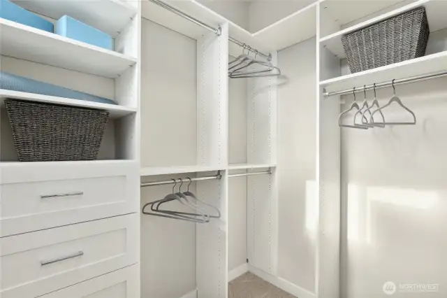 Primary bedroom closet comes with this built-in closet organiser!