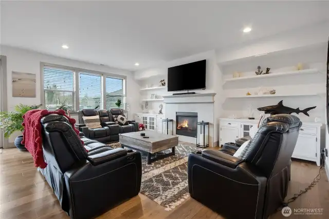 Living room with gas fireplace.