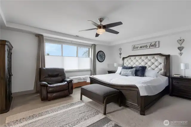 Large primary with room for a king sized bed.
