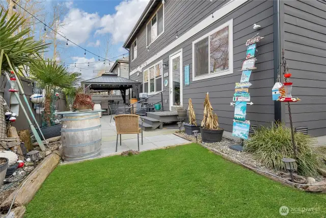 Backyard is small but room to entertain on patio.