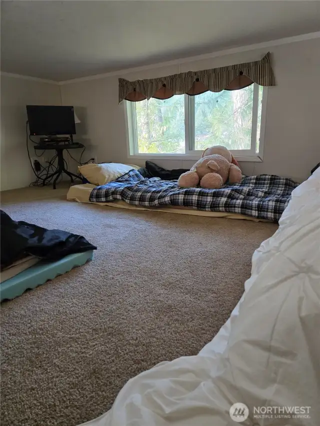 loft sleeping area with its own tv