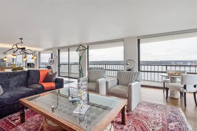 Large windows align with the length of the water view side.