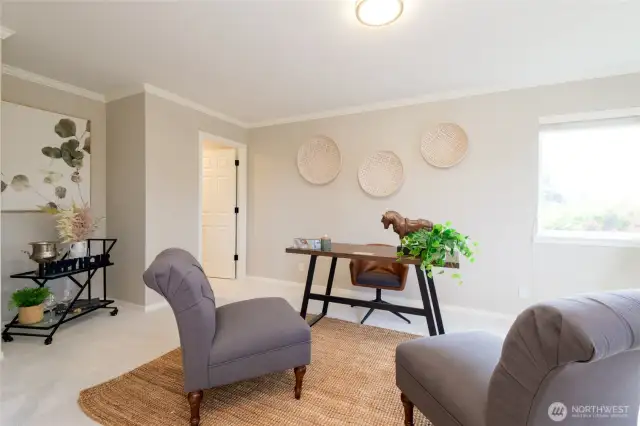 Spacious and filled with natural light, the main floor office/den is the perfect flex room to suit your needs.