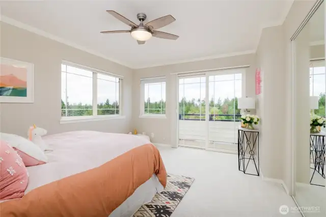 The convenient layout includes three bedrooms on one level. Bedroom #2 also hosts it's own private balcony overlooking Lincoln Park, and enjoys peek-a-boo Olympic Mountain and Puget Sound views.