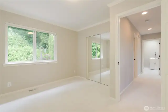 Bedroom #3 with backyard views and soft, plush carpet underfoot!