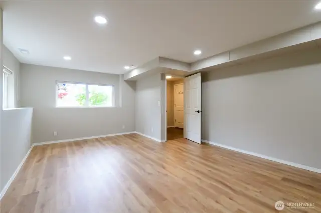Located on the lower level—the spacious fourth bedroom is ideal for an exercise room, office, art studio or? With a large closet it offers fantastic storage and flexible use.