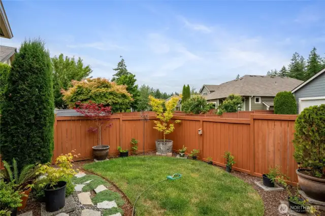Landscaped and loved over the years, it is low maintenance and charming.