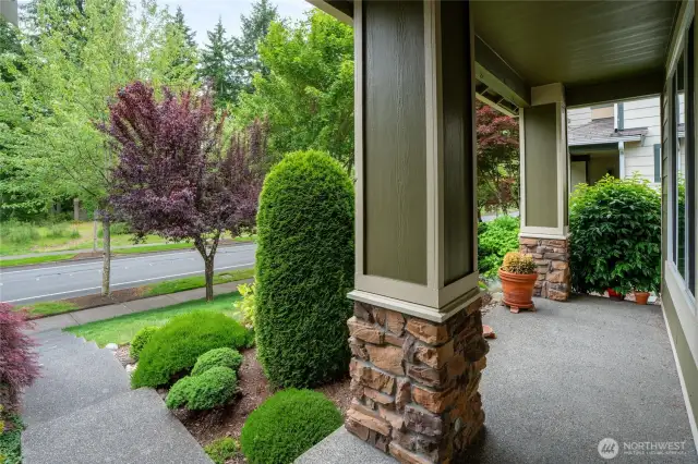 The street on the front face of the home does not allow for parking. The garage is on the backside. Enjoy this porch all year round.