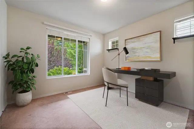 Bedroom #1 : Virtually staged as an office space, the room could easily fit a queen size bed as well.