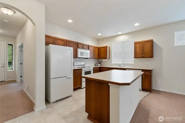 Open floor kitchen/living room layout. It is clean and very well maintained.