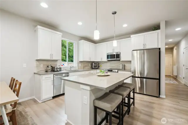 You'll notice in person the ceiling height is higher than many 1-level homes, adding to spacious feel & flow