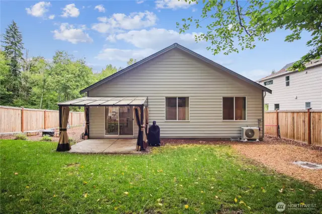Fully fenced level back yard is a palette awaiting your own landscaping plan