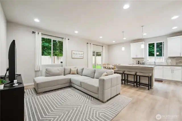 View of great room area that leads to back yard space