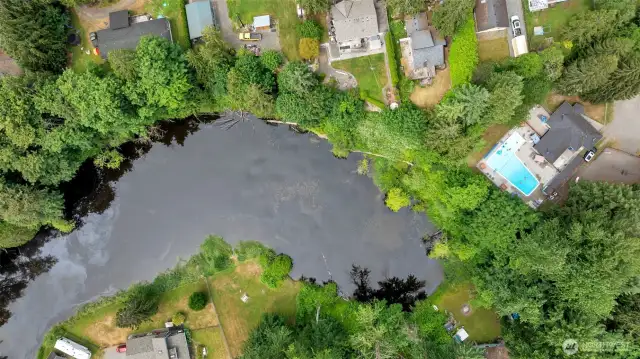 Clubhouse, pool, and river access in this image