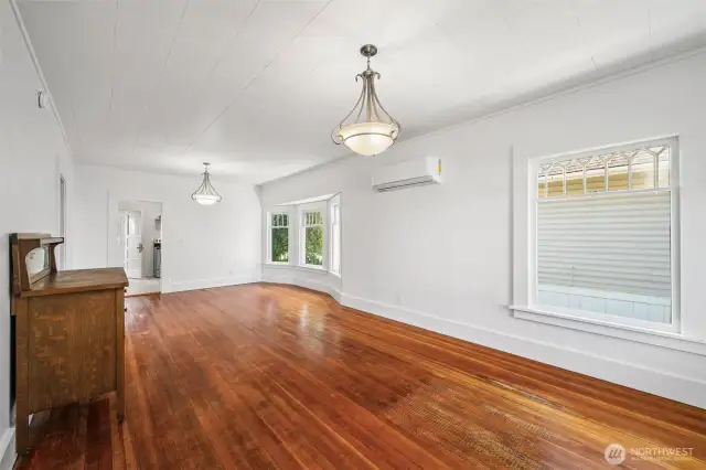 Refinished fir floors and new light fixtures make this an inviting living space or office.