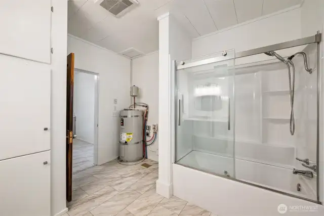 Laundry hook ups by water tank