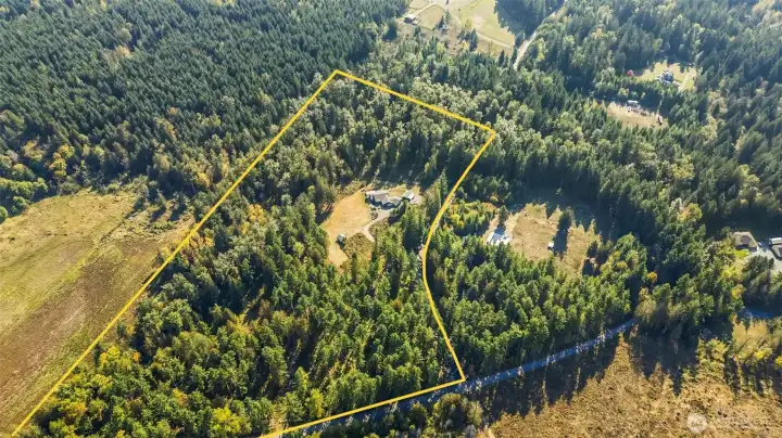 This home is very private, situated on 19.24 acres and surrounded by a mature forest. Tranquility and timber value! Property lines are approximate.