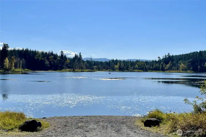 The community boasts private amenities for resident use which includes miles of trails for walking, hiking or horse back riding. As well as multiple covered picnic areas, fire pits, and a private lake with boat launch for fishing, kayaking, etc.