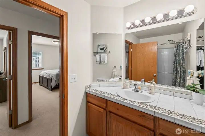 Another view of the main bath, looking towards the hallway.