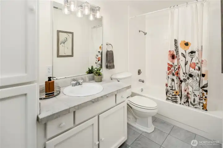 Hall Bathroom with Bath and Shower