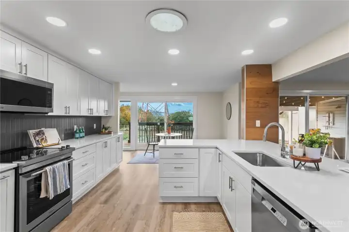 What a kitchen! Entertain, or just cook the daily meals here. It's such a luxurious setting, every day is like living in a resort.