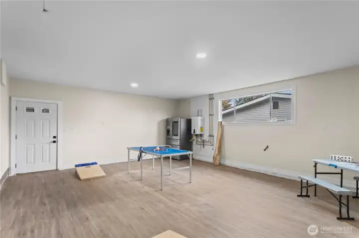 Rec Room located just beyond the kitchen and family room.