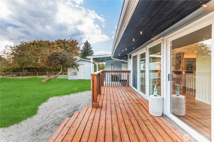 Custom rear deck overlookiing rear yard (complete with cupholders)