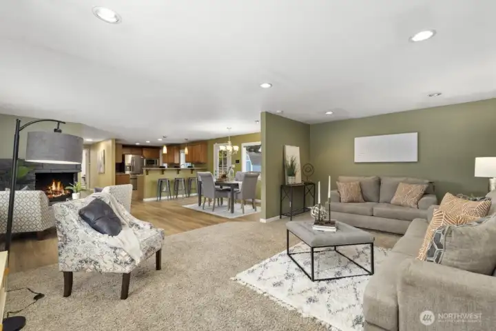 From the living room, looking into your dining room, kitchen, and part of the back deck.