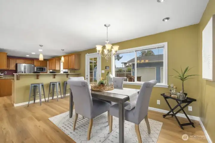 Easy access to the back deck and backyard for outdoor dining, hanging out, or getting to your garage.