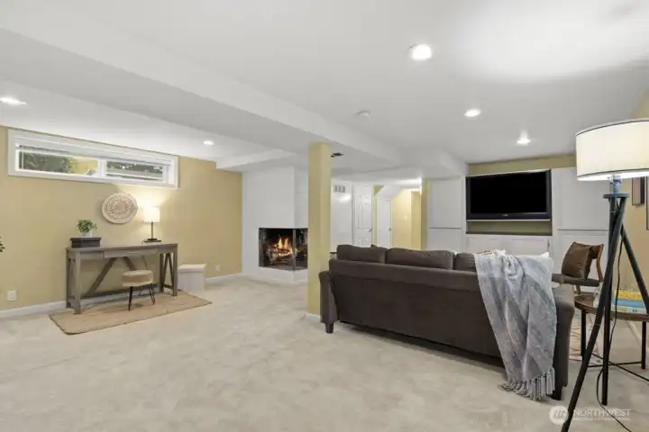 Let's head downstairs, where you have an additional large living space.