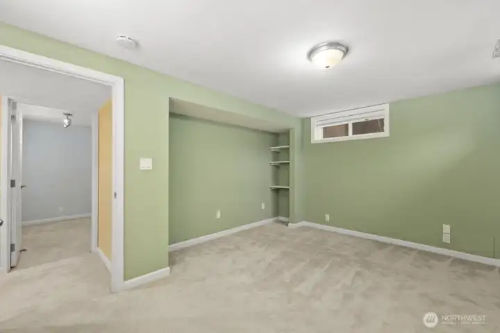 One of two bedrooms downstairs.