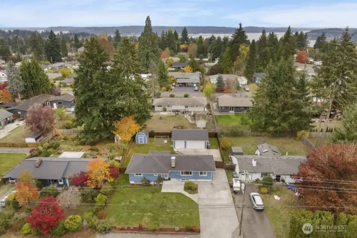 Enjoy parking in front of the house, a spacious drive way, RV parking, and a large garage.