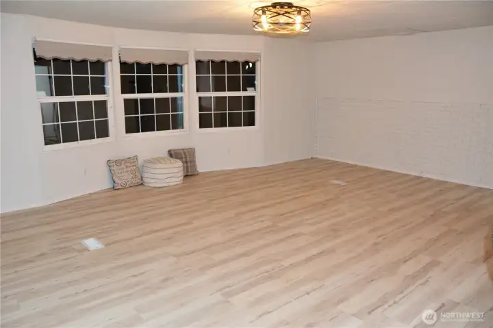 Large living room with new flooring and paint~