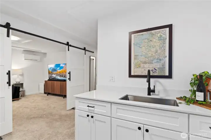 Looking towards the media area - barn doors allow this to be closed off for privacy/sleeping area?